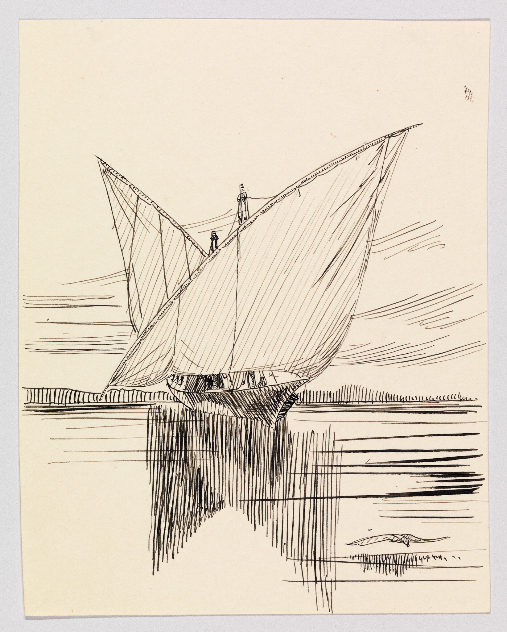 Sailboat with two large triangular sails glides on calm water with clear reflection.