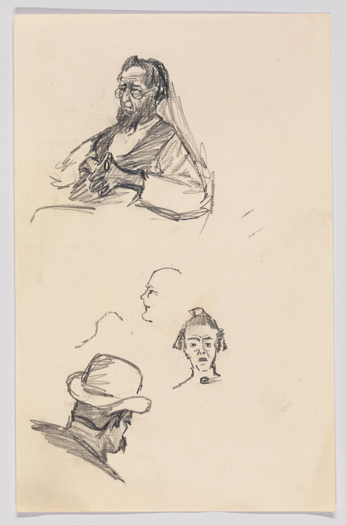 Several quick pencil sketches showing a seated bearded man, a hat-wearing profile, and small head studies.