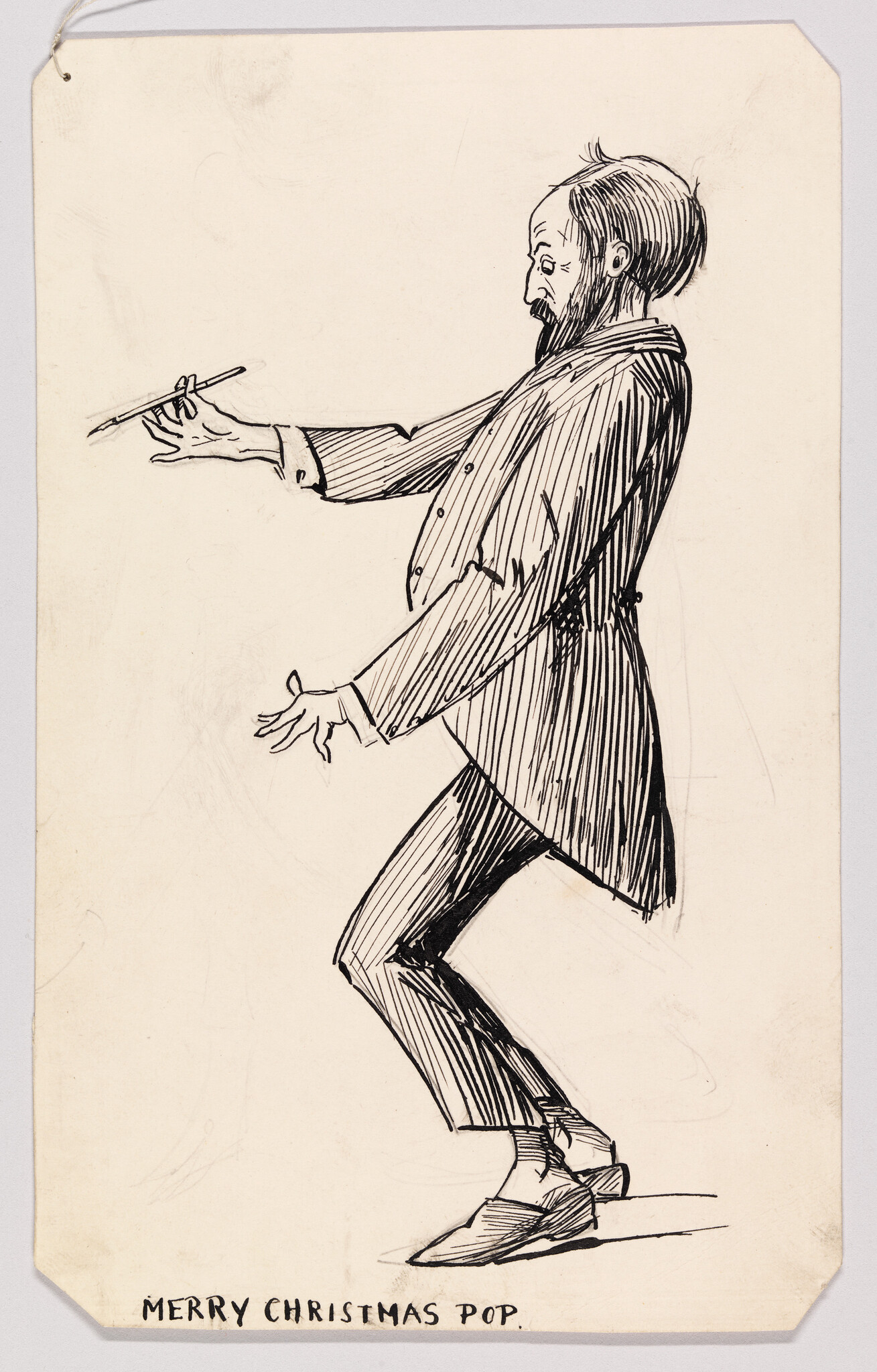 A bearded man in a suit leans back holding a pen, text reads "Merry Christmas Pop.".