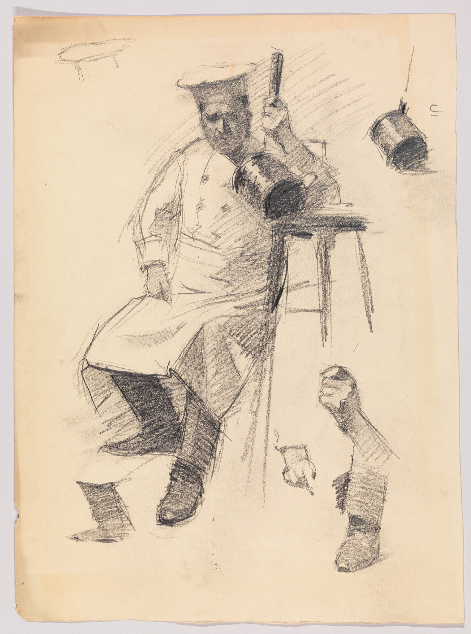 A seated man wearing an apron and cap holds a mallet above a bucket on a stool.
