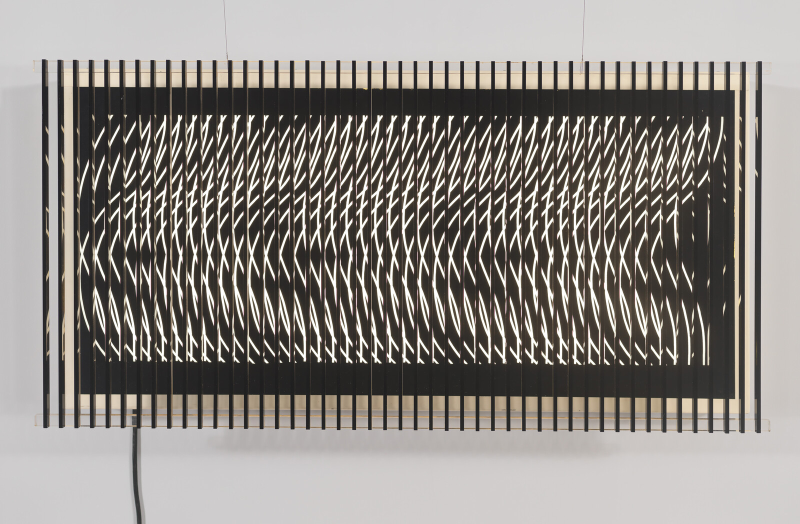 Rectangular light installation with evenly spaced vertical slats producing a shifting wavy white light pattern.