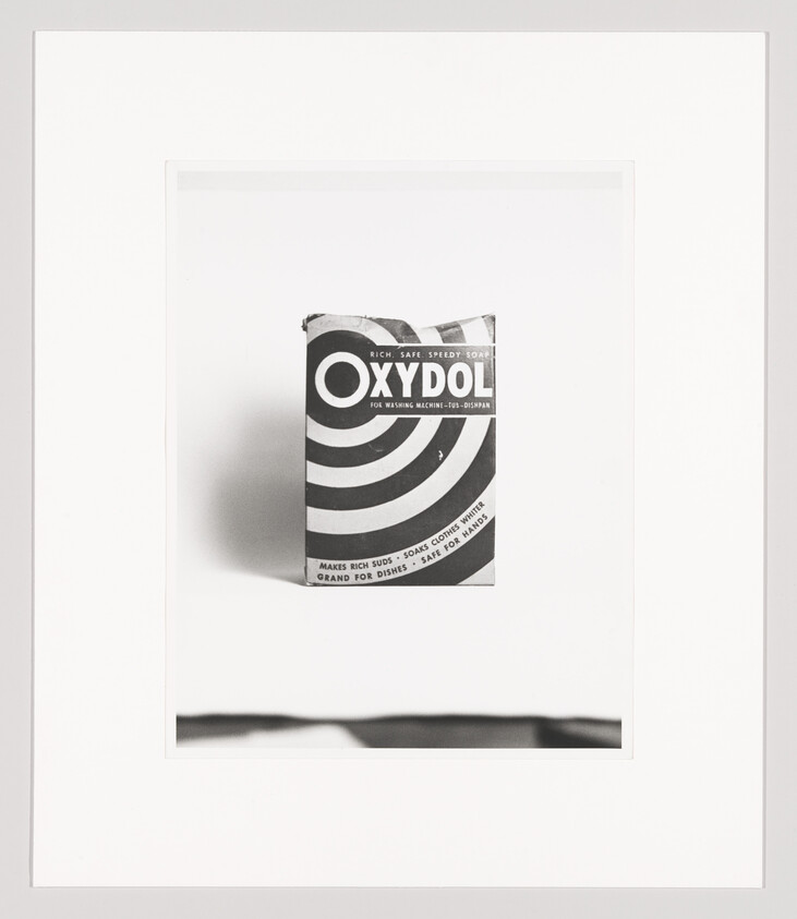 A vintage Oxydol laundry soap box with concentric circle design centered against a light background.