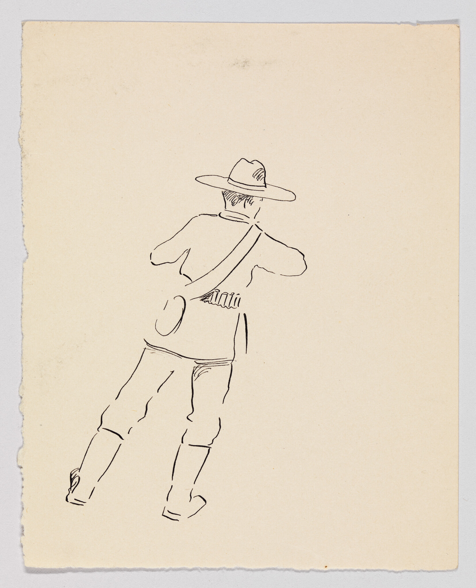 Man wearing a wide-brim hat seen from behind, leaning with a satchel and bandolier.
