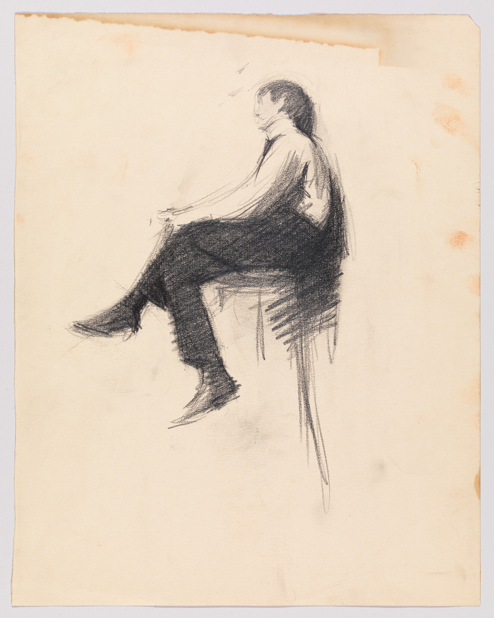 A charcoal sketch of a man sitting sideways on a high stool with legs crossed.