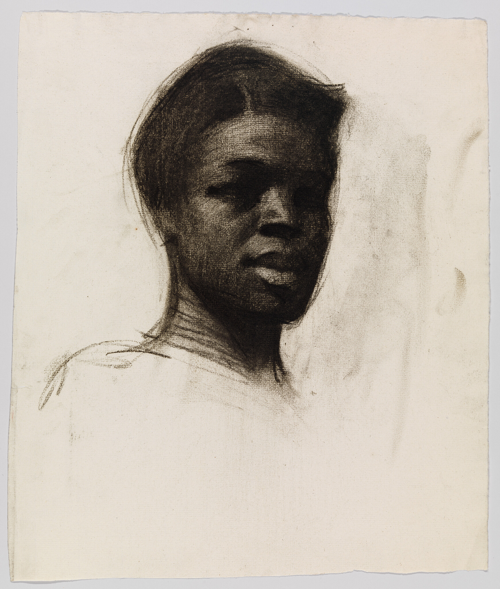 Charcoal portrait of a person with short hair looking slightly to the right, neutral expression.