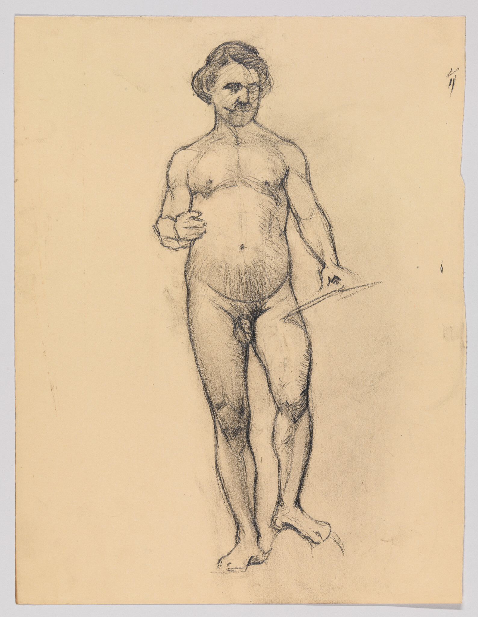 A standing nude male figure drawn in charcoal, holding a stick with one hand.