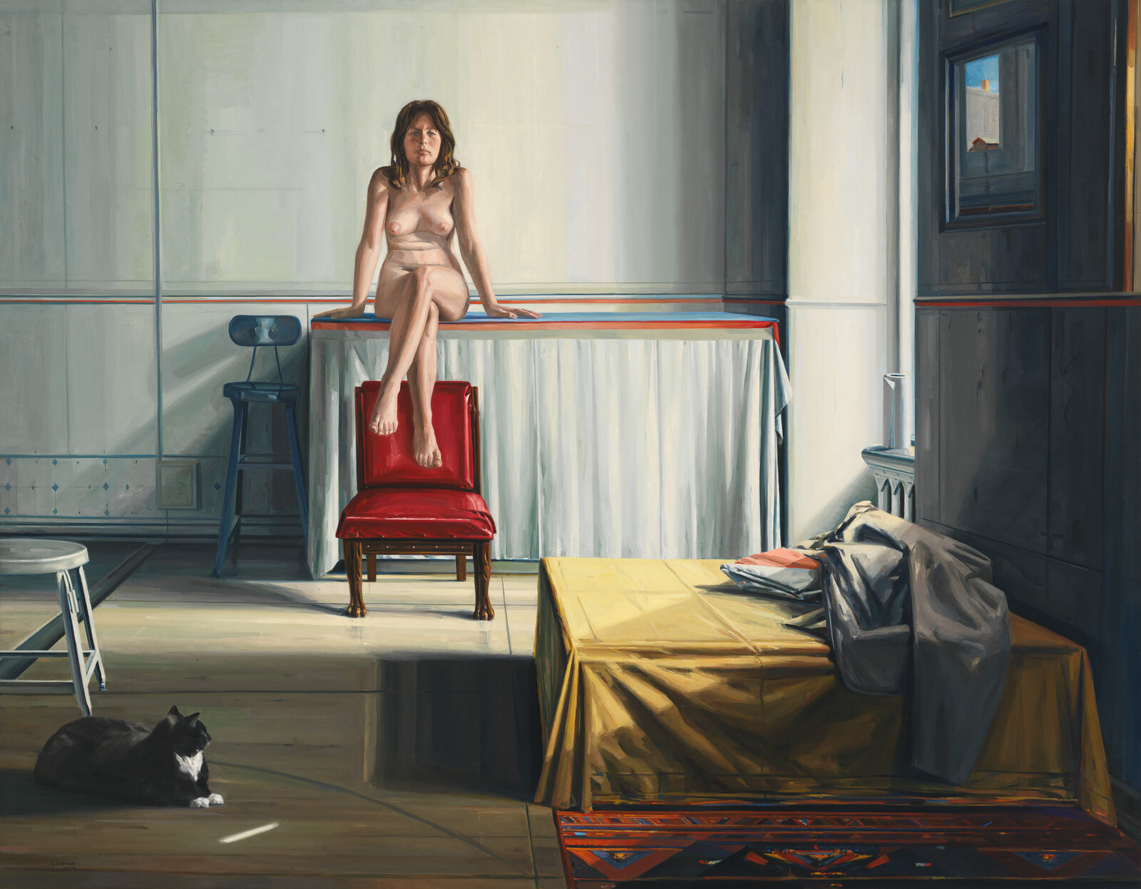 A naked woman sits on a tall draped platform with crossed legs above a red chair.