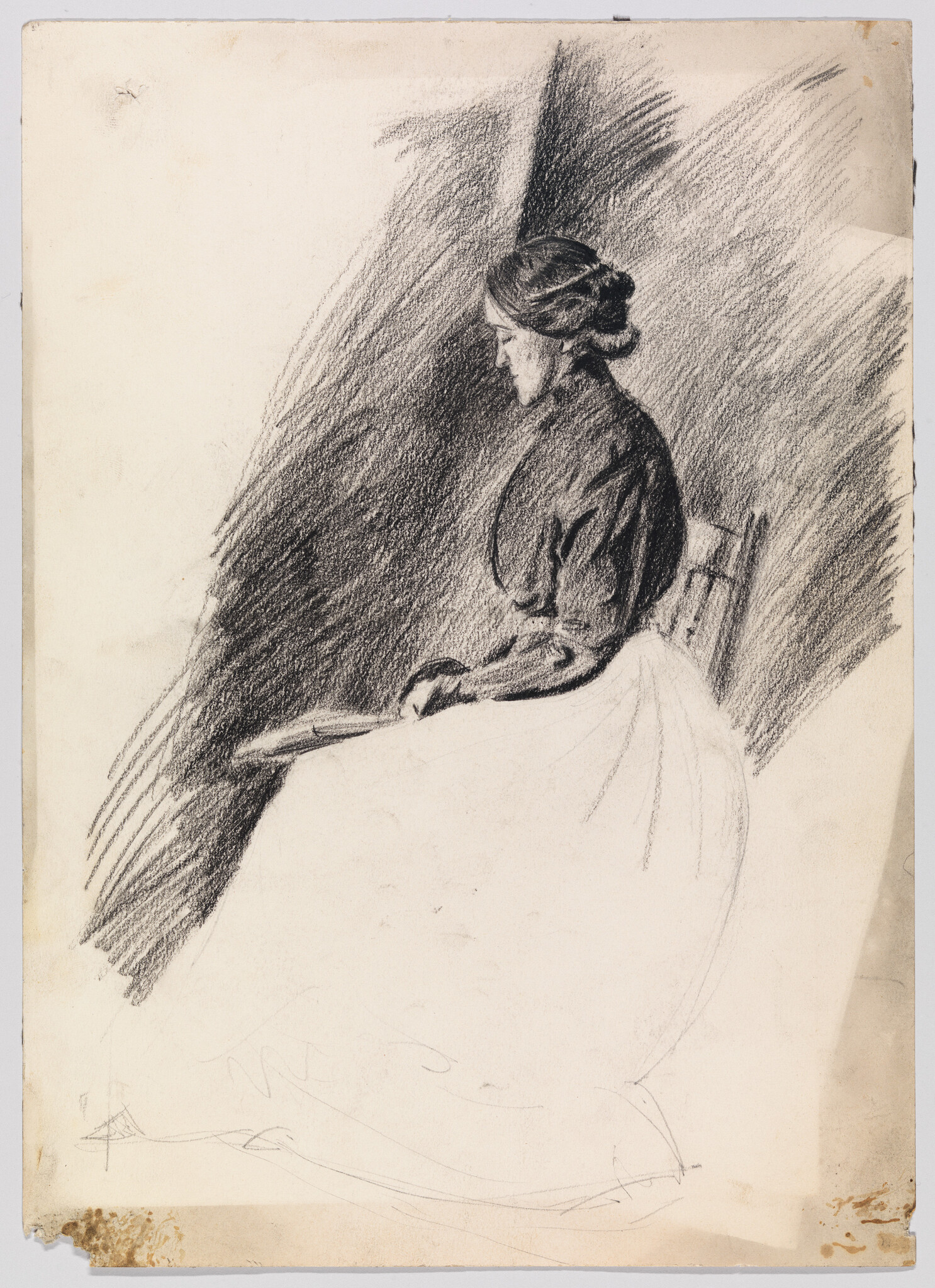 A seated woman in profile with her hair in a bun, hands resting in her lap.