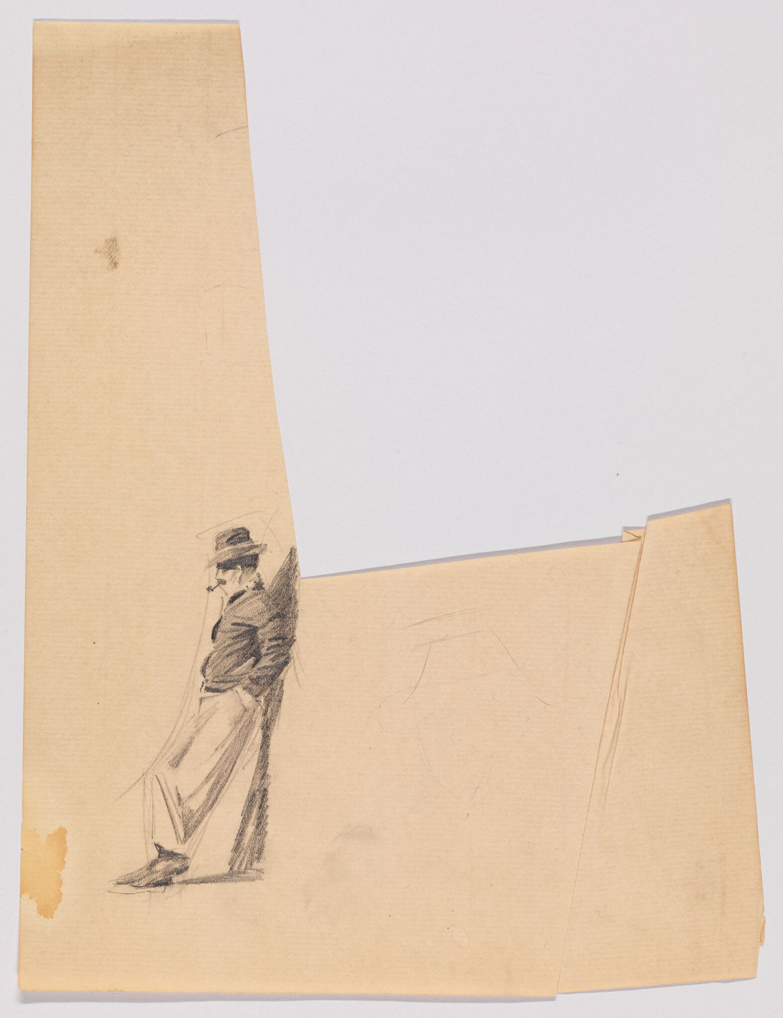 A man in a hat leans against a wall with hands in pockets, appearing to smoke.