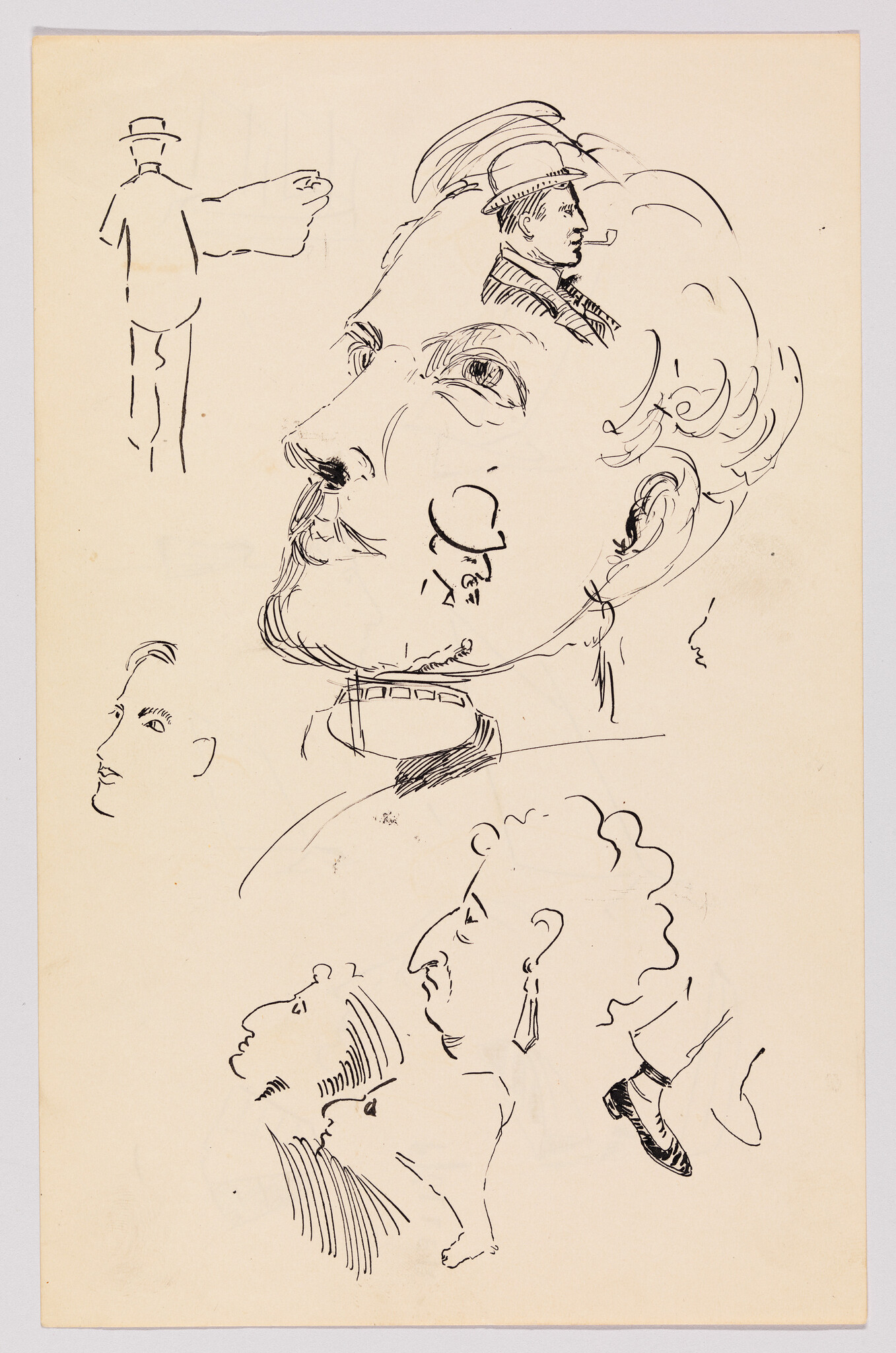 Multiple ink sketches showing a large male profile and several smaller head and figure studies.