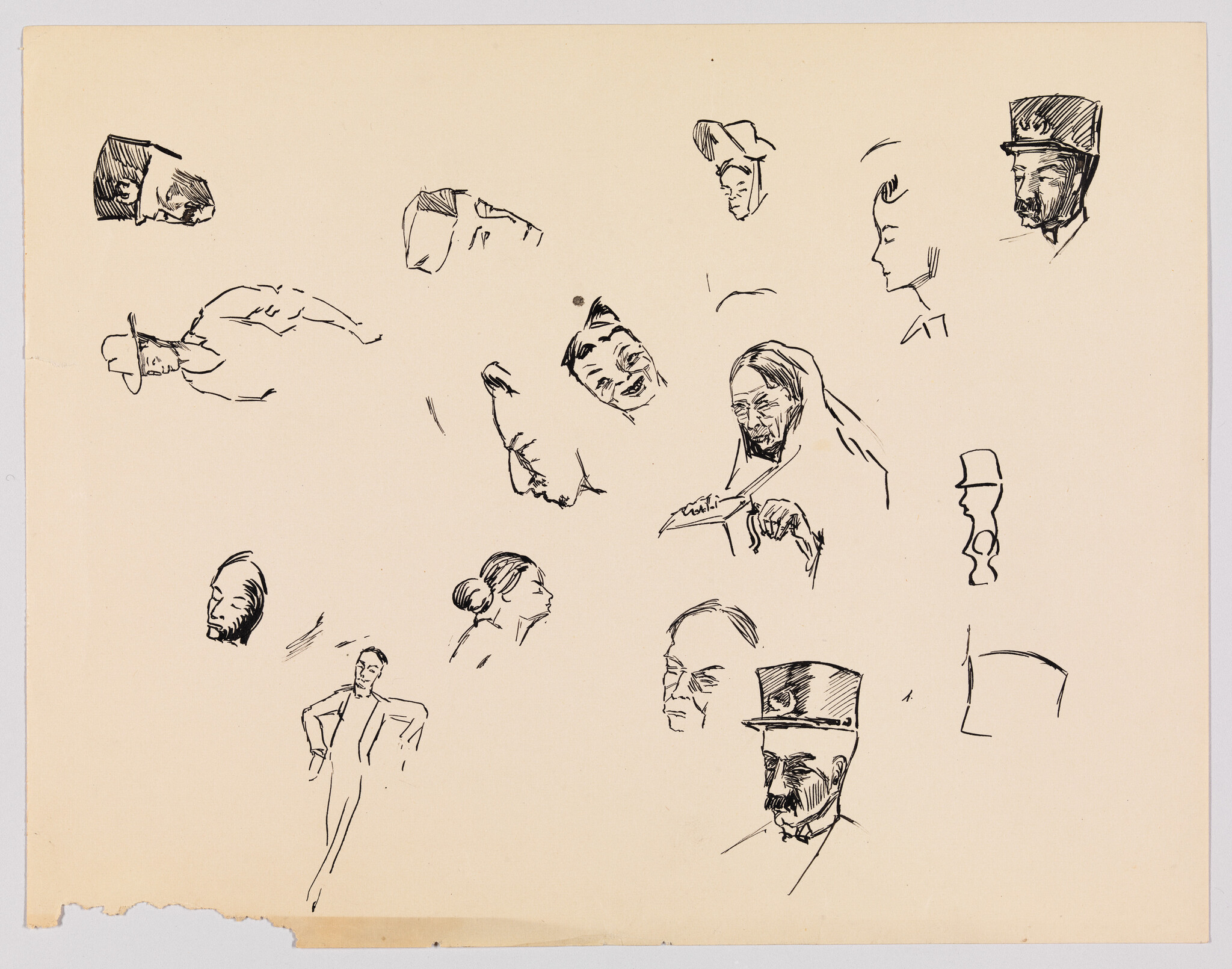 Several quick ink sketches of different people’s heads and faces scattered across a sheet of paper.