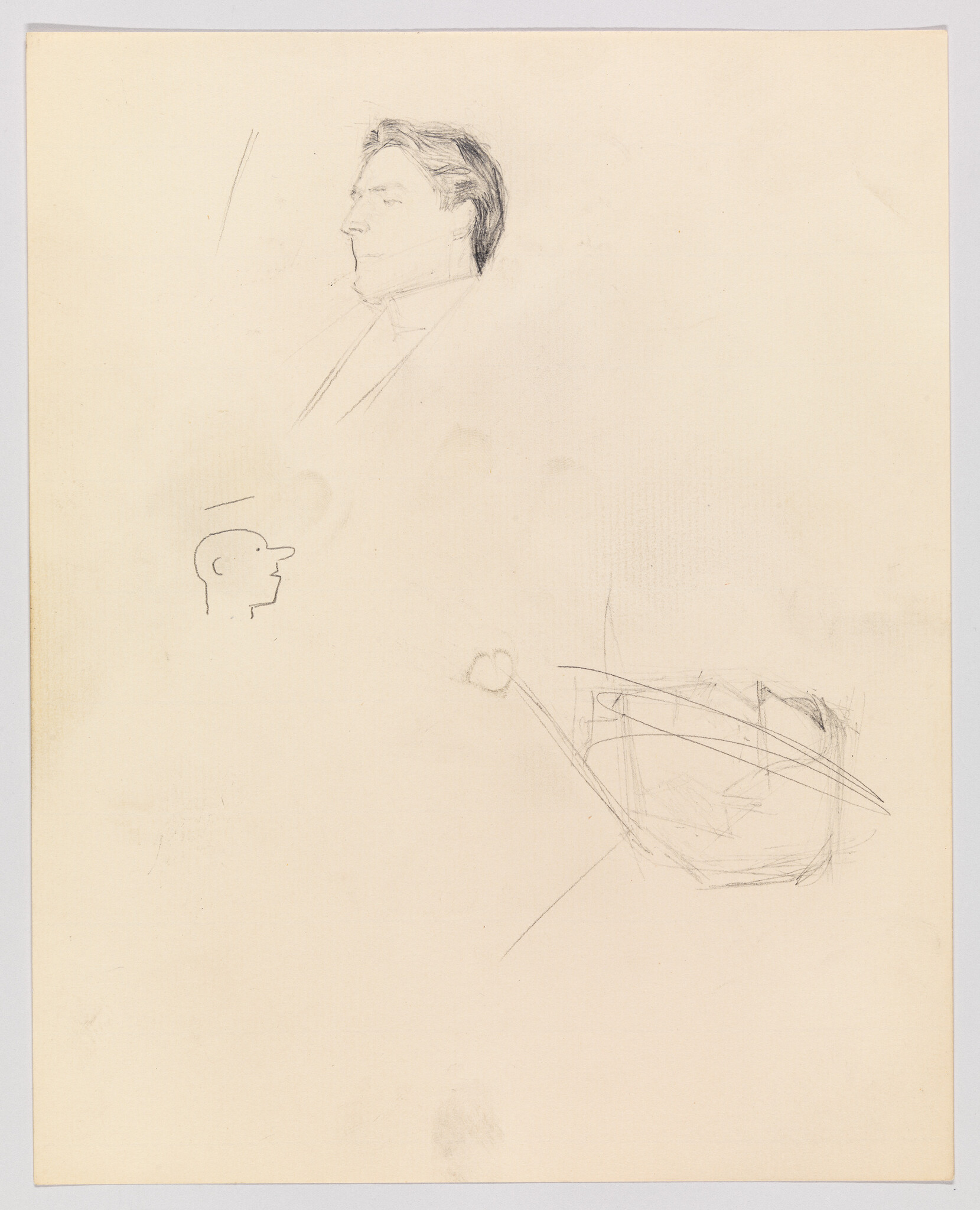 Pencil sketches showing a detailed male profile, a simple cartoon head, and loose scribbles.