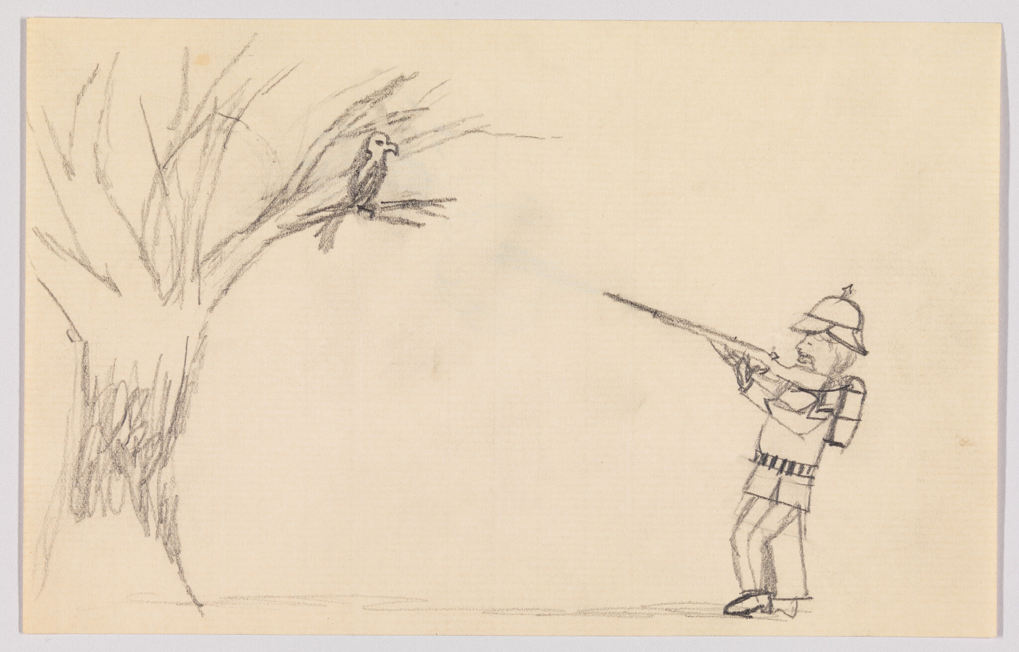 A man in a helmet aims a long rifle at a bird perched on a tree branch.