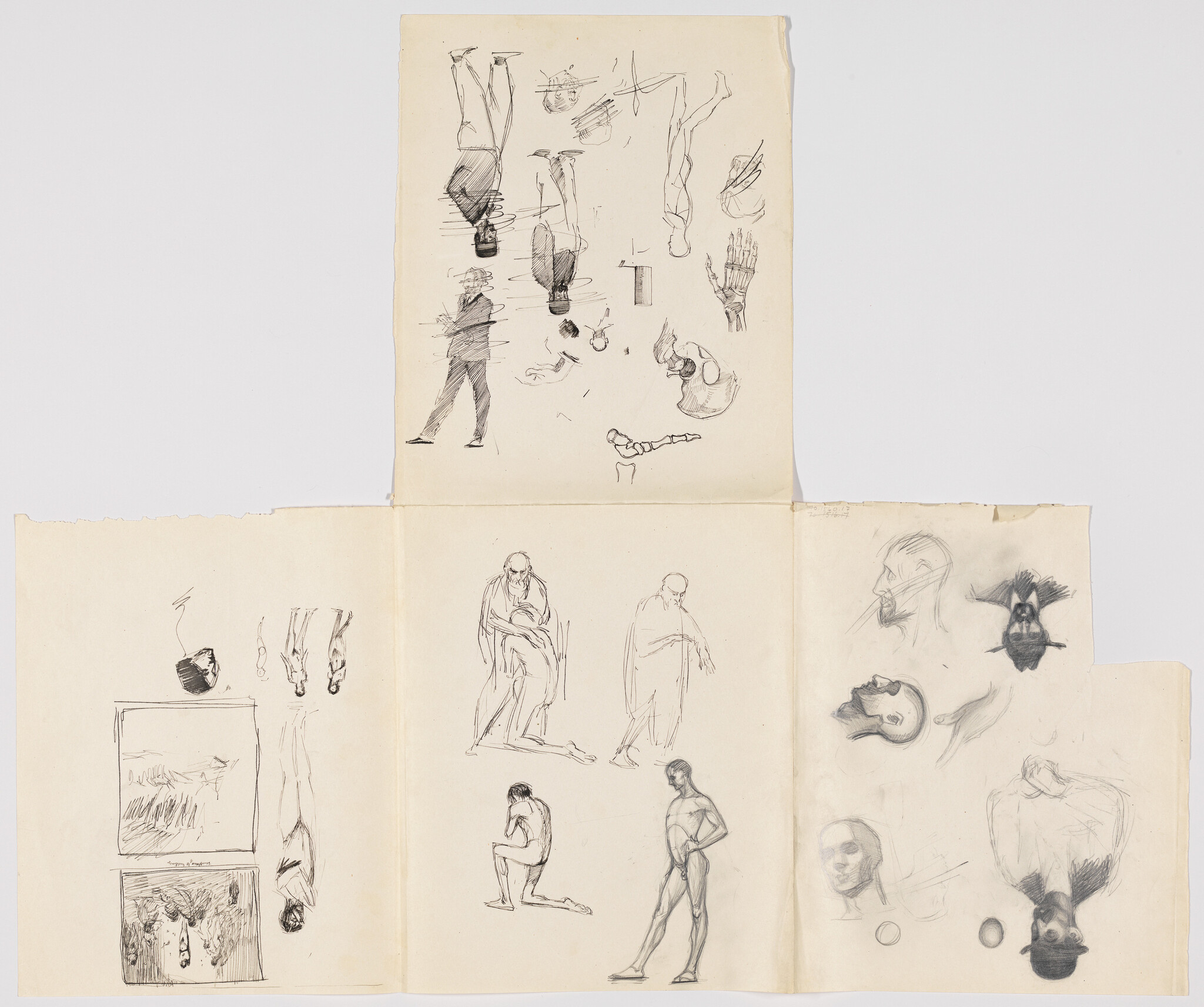 Folded sheets covered with pencil figure sketches and anatomical studies, including heads, hands, and poses.