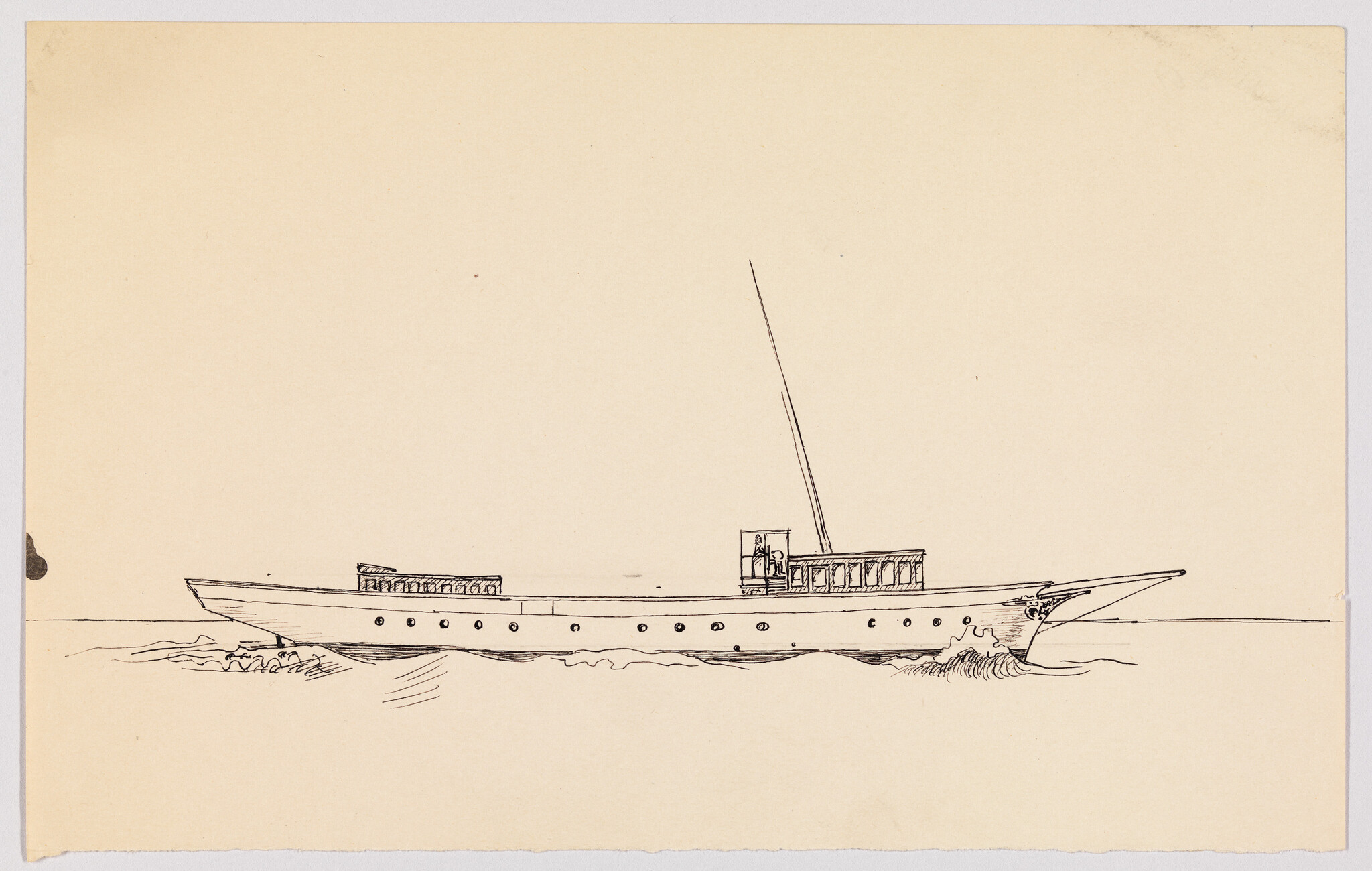 A long slender yacht with a tall mast sailing smoothly across calm water.