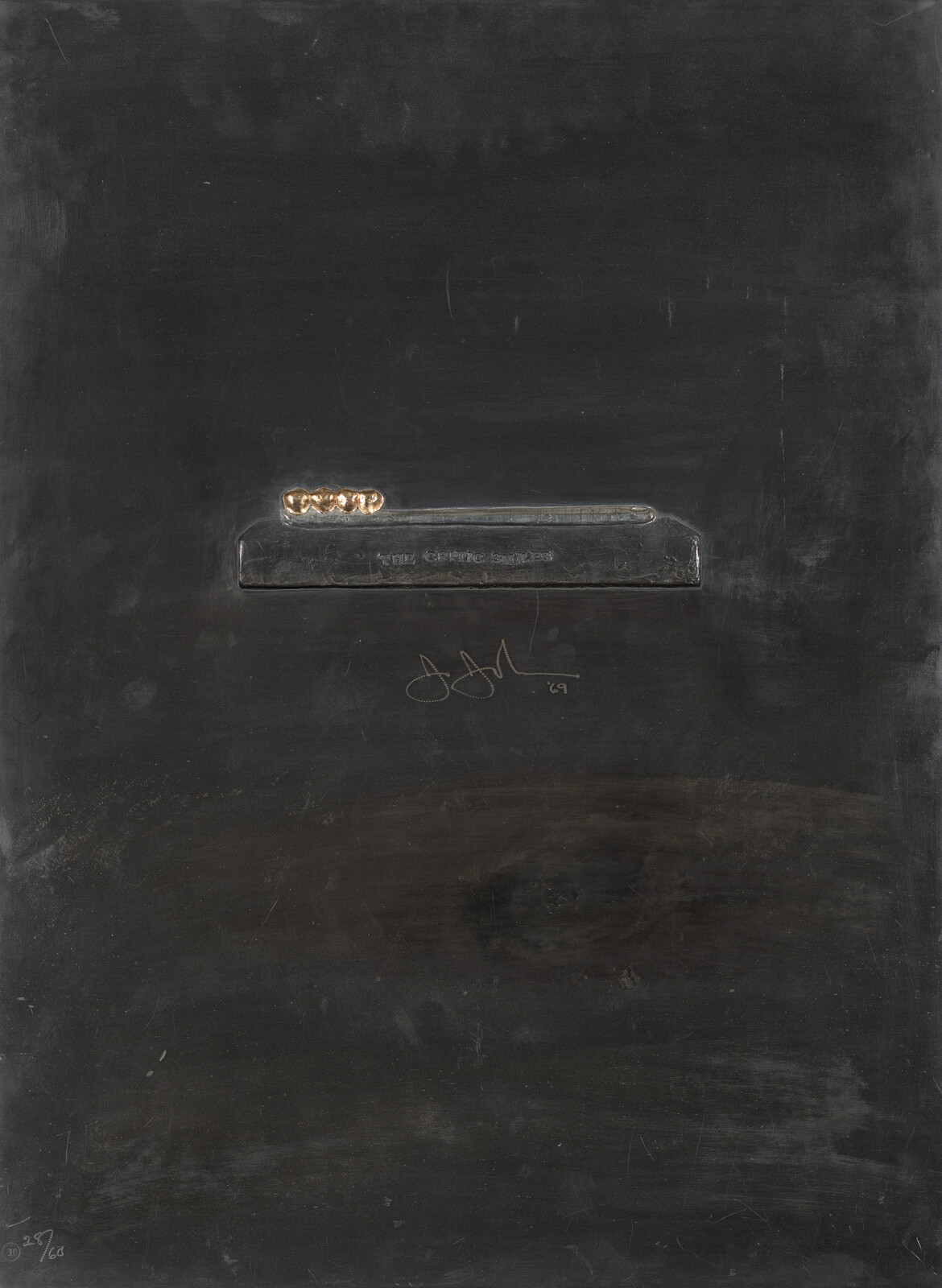 A dark panel with a small metal bar holding five gold tooth-shaped forms centered near the top.