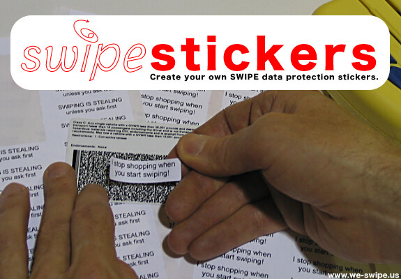 Hands apply a small sticker reading "stop shopping when you start swiping" among many printed labels.