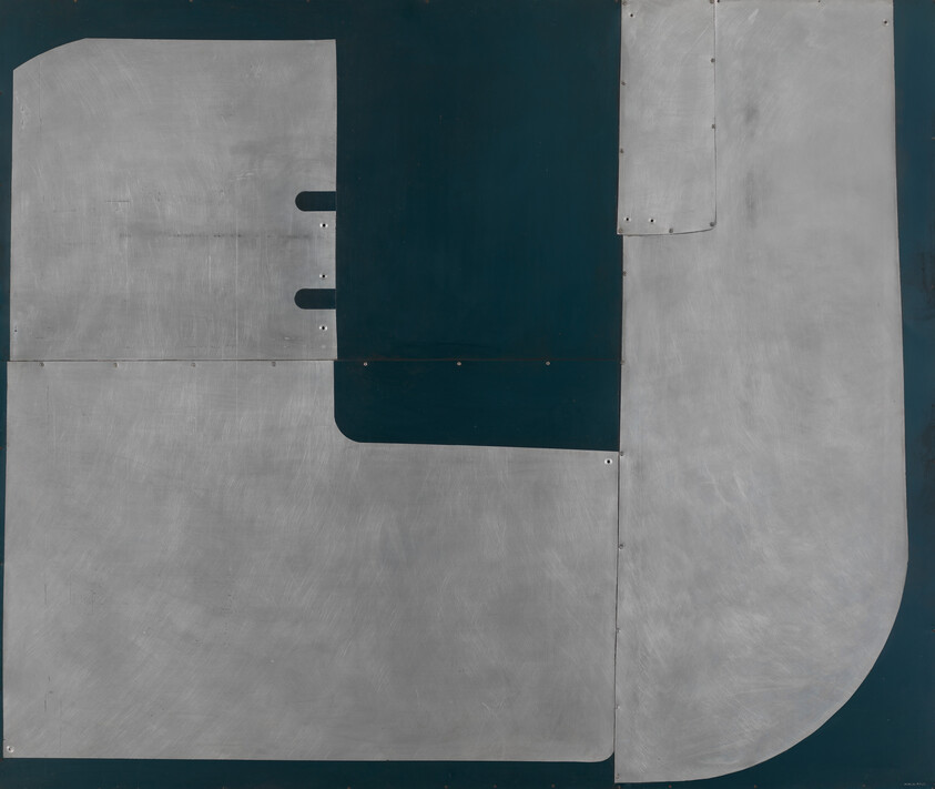 Large overlapping silver metal panels with rounded corners and rivets on a dark teal background.