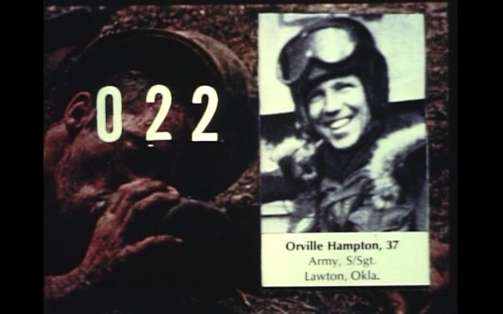 A vintage image showing a large number "022" in green overlaid on a scene with a soldier in a helmet, and a photograph of a smiling serviceman in uniform with the name Orville Hampton, age 37, Army S/Sgt. from Lawton, Okla.