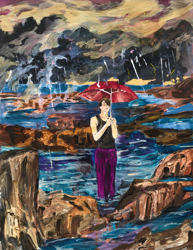 A person holds a red umbrella while standing in rocky tidal pools under a stormy sky.