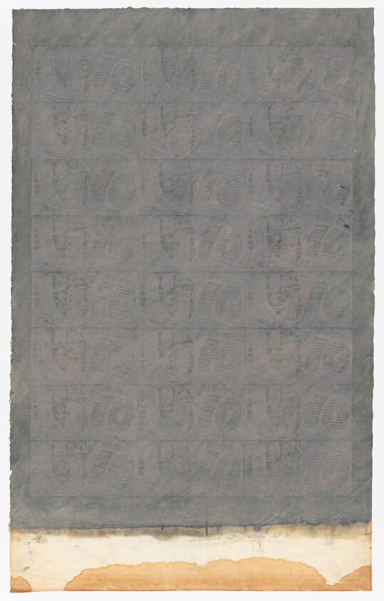 Gray textured surface with faint, repetitive "YOYO" pattern, bordered by a lighter, stained edge.
