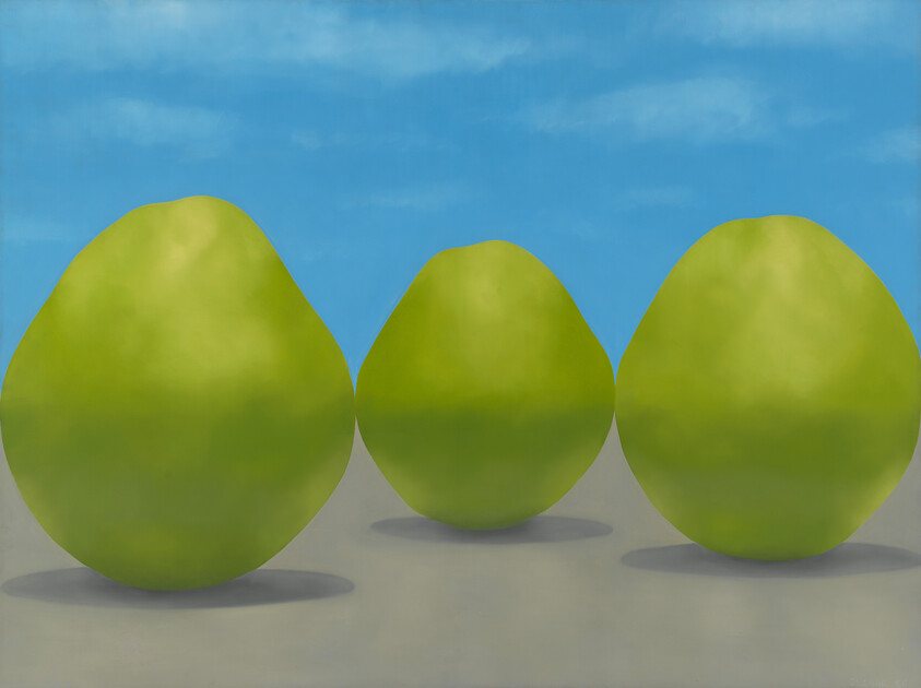 Three large green pears sit on a flat surface under a clear blue sky.