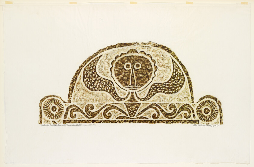 A stylized symmetrical lion face and decorative scrollwork printed in brown on white paper.