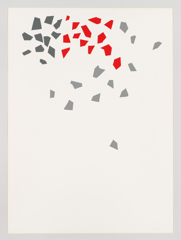 Red and gray geometric fragments scattered near the top of a large white background.