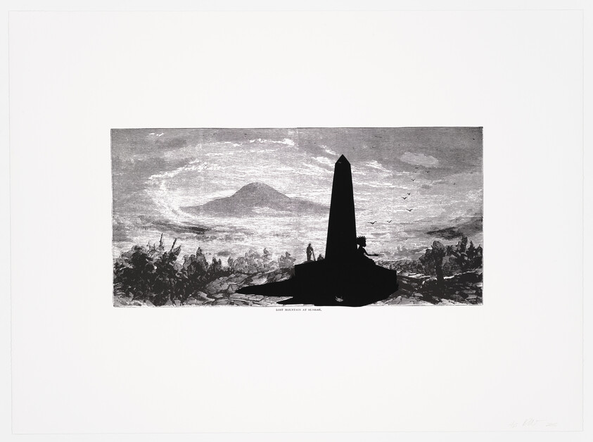 A tall obelisk silhouette stands on a rocky hill with people and a distant mountain.