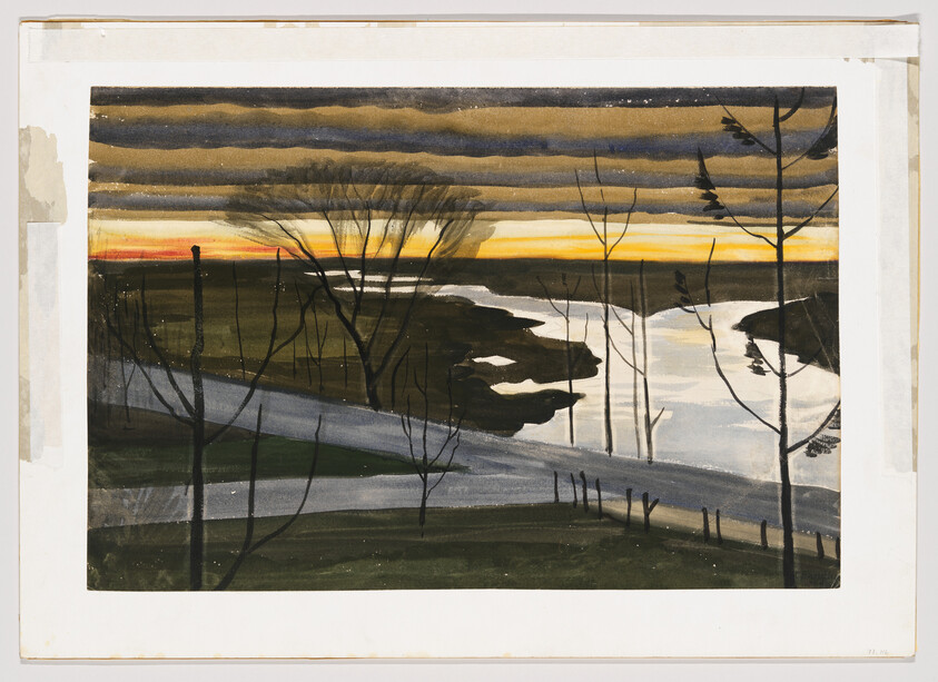 Bare trees stand along a winding river under a low orange sunset and layered gray clouds.