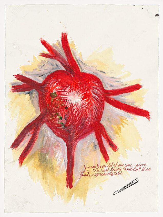 A bright red painted anatomical heart with branching arteries and a handwritten note at bottom.