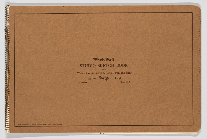 Brown spiral-bound sketchbook with centered printed label reading "Studio Sketch Book" for drawing.