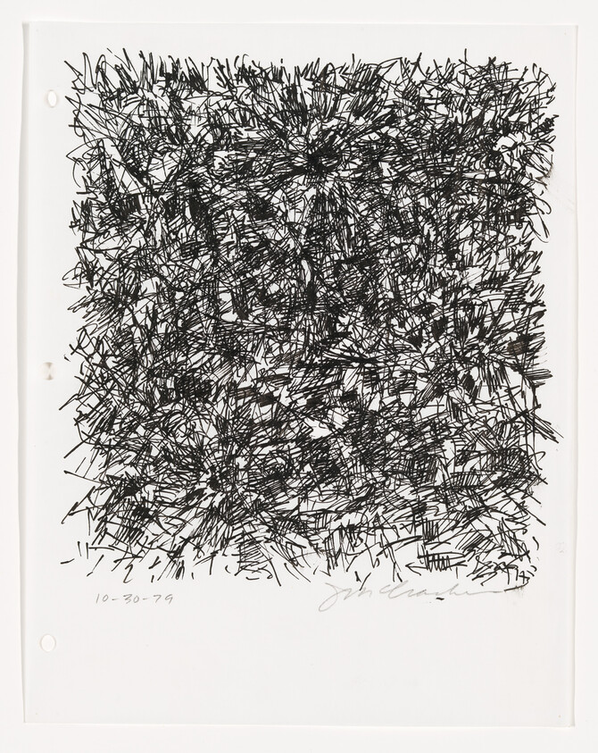 Dense black marker scribbles form a roughly square, chaotic pattern on white paper.
