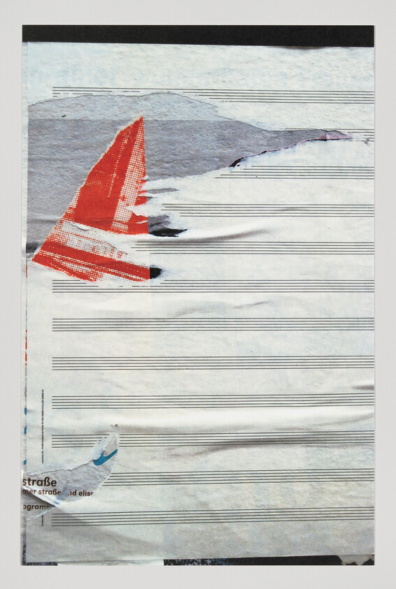 Worn sheet music paper with torn posters revealing a red triangular shape near the top left.