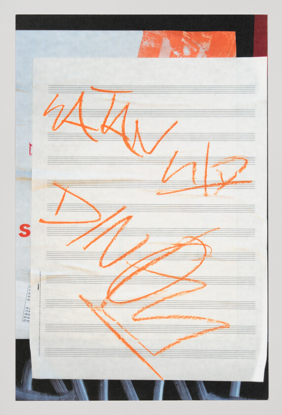 Sheet music paper with bold orange crayon scribbles across the staff lines.