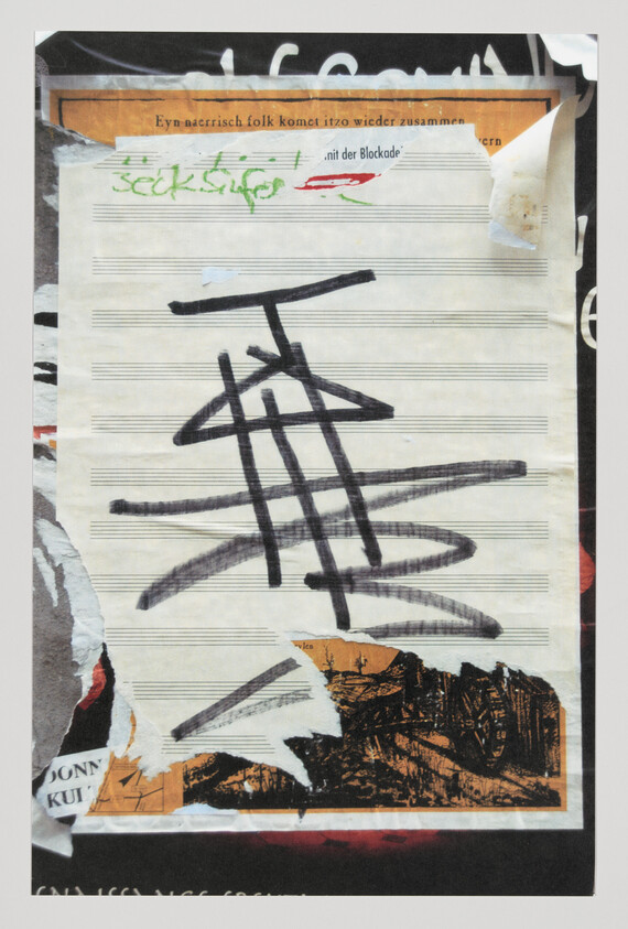 Sheet of torn music paper pasted on poster with bold black graffiti scribbles across it.