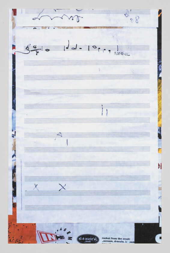 Blank sheet of music staff paper with a few pen scribbles and two X marks at the bottom.