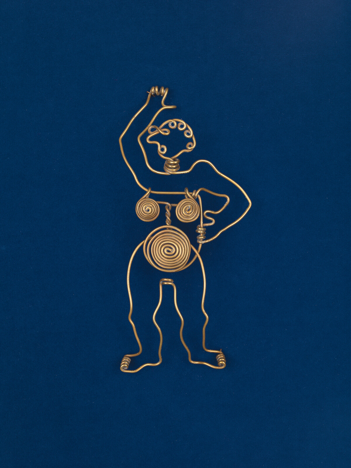 A golden wire sculpture of a standing person with one arm raised on a blue background.