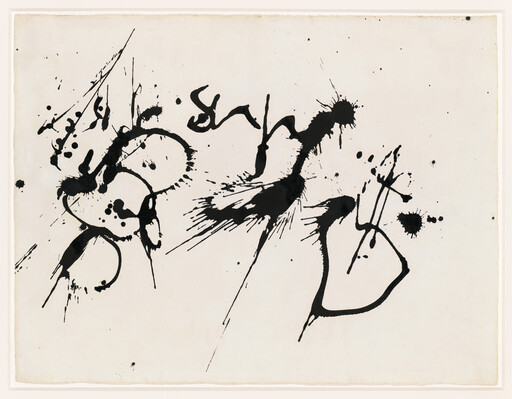 Black ink splatters and sweeping brush strokes form abstract shapes across a white sheet.