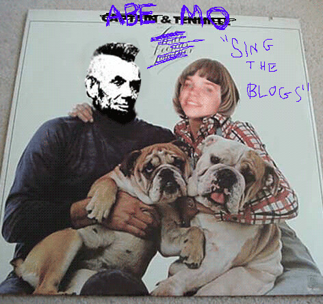 Two people with altered faces holding bulldogs, with text "Abe & Mo" and "Sing the Blogs" written in purple.