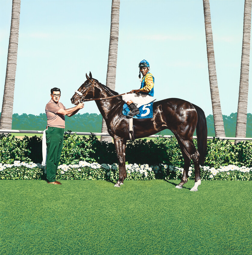 Jockey wearing blue and yellow sits on dark racehorse marked with number 5 while handler holds its reins.
