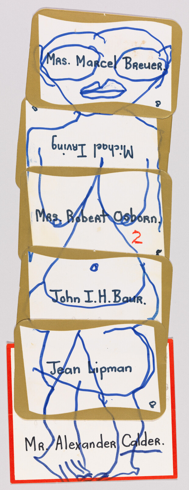 Stack of handwritten name cards showing blue marker sketches of faces and torsos.