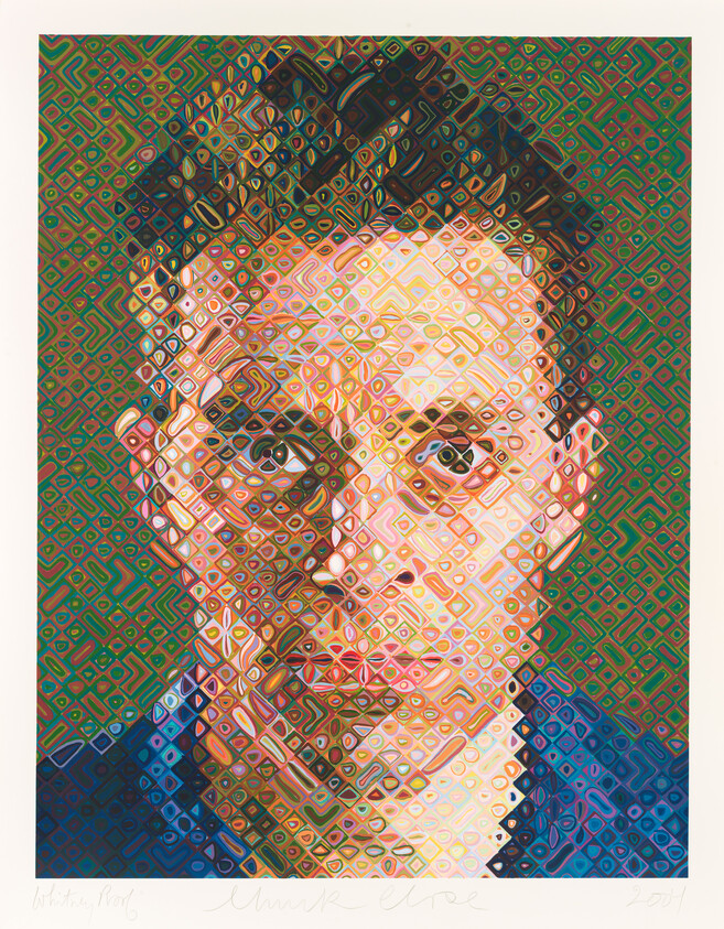 A man’s face with a serious expression, covered by a colorful grid of geometric patterns.