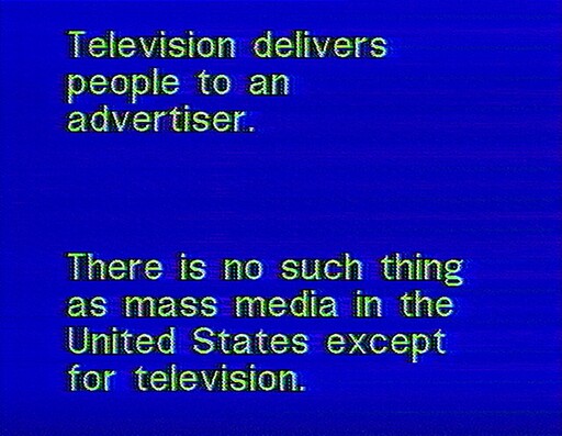 Blue screen with white text stating television delivers people to advertisers and dominates mass media.