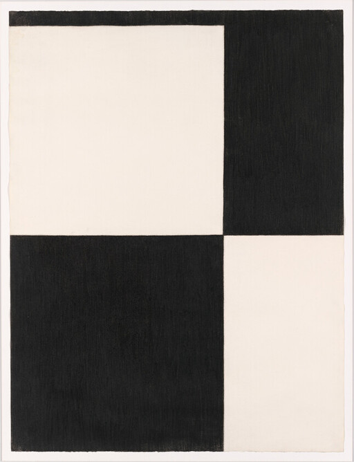 Four large black and white rectangles form a simple checkerboard-like grid on paper.