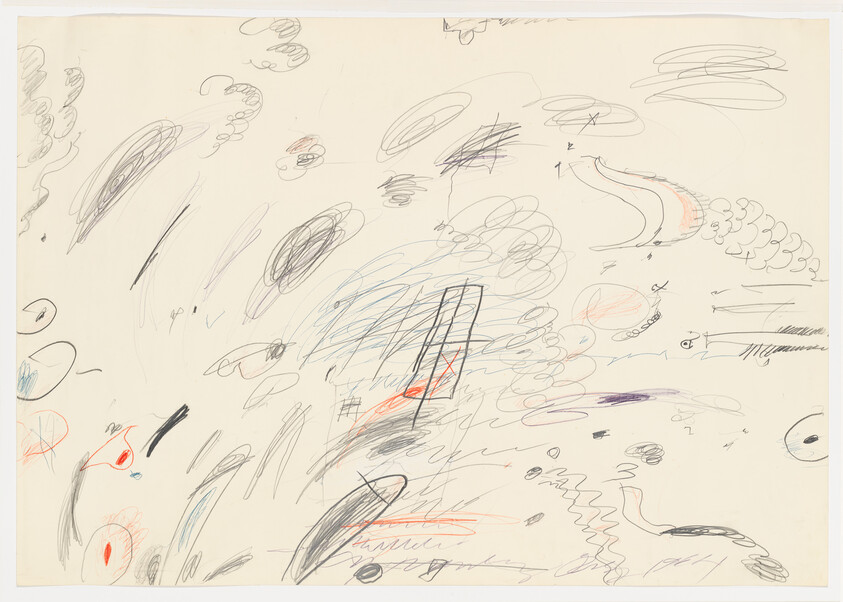 Chaotic pencil and colored-pencil scribbles and doodles scattered across a large cream sheet of paper.