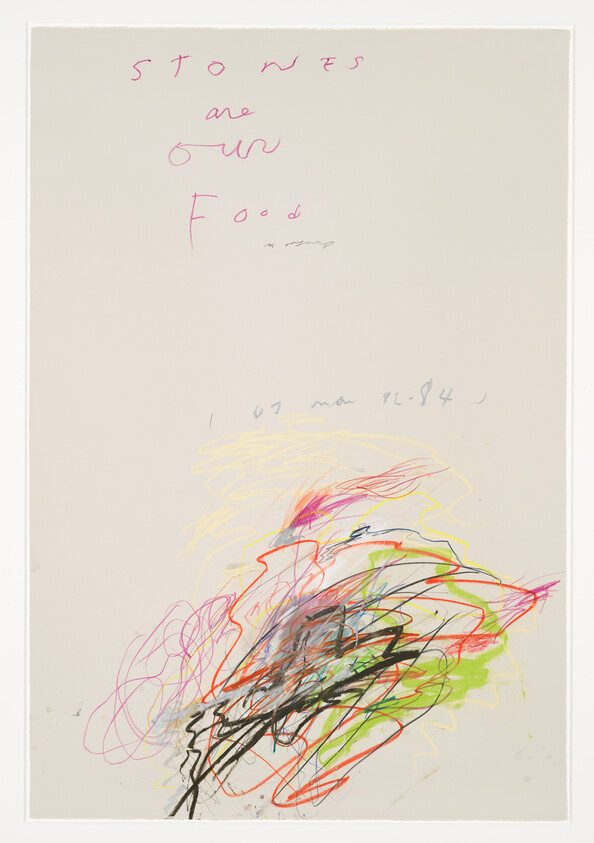 Abstract colorful scribbles near the bottom with handwritten text reading "Stones are our food" at the top.