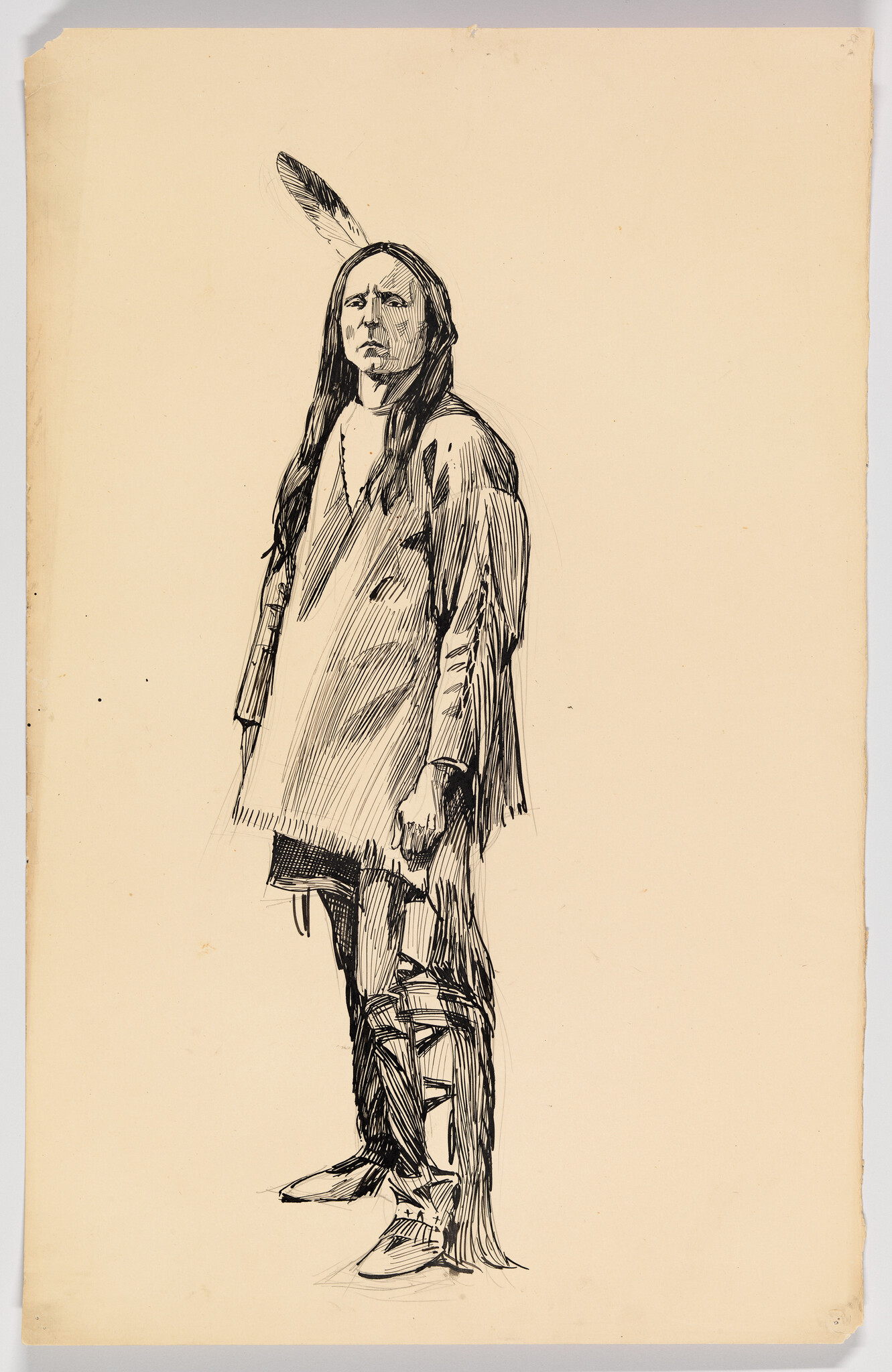 A standing Native American man in traditional clothing with a single feather in his hair.
