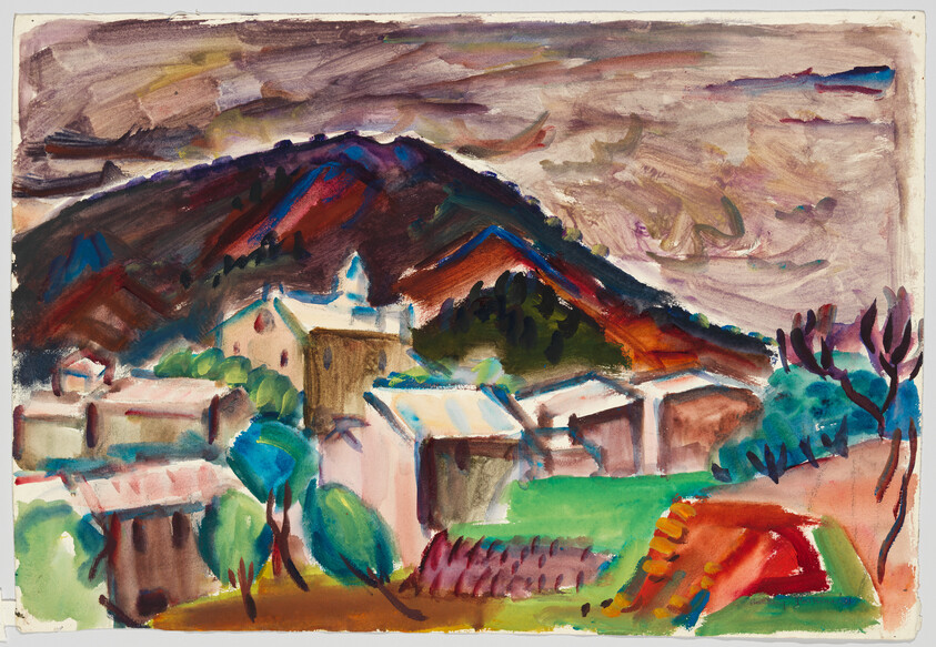A colorful village with white houses and trees at the foot of a dark, looming mountain.