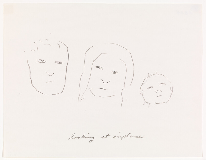 Three simple pencil faces looking upward with handwritten caption "looking at airplanes."